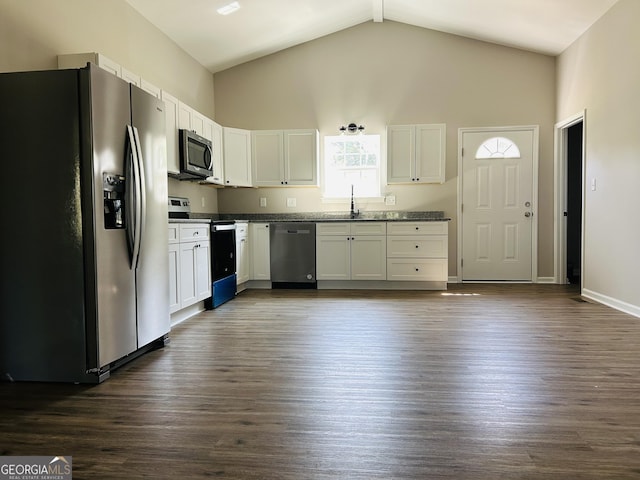 kitchen featuring stainless steel appliances, dark hardwood / wood-style flooring, high vaulted ceiling, and white cabinets