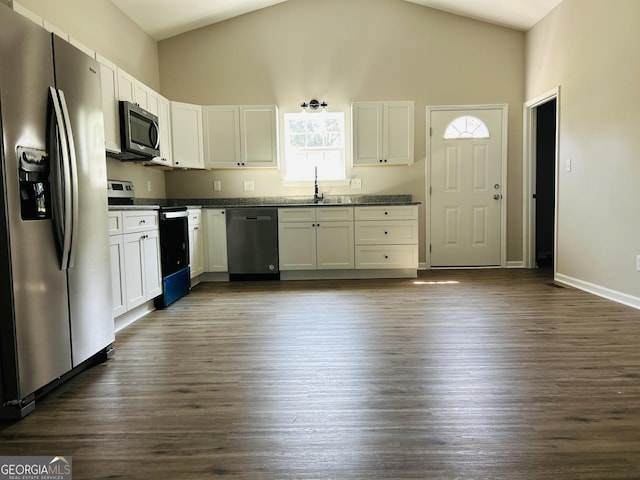 kitchen with white cabinetry, sink, dark hardwood / wood-style flooring, and appliances with stainless steel finishes