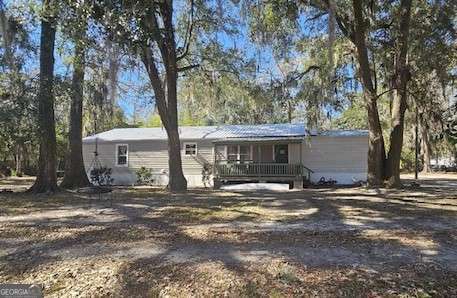 view of front of house featuring a deck