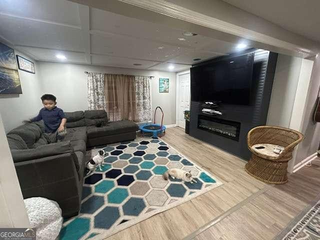 living room with wood-type flooring