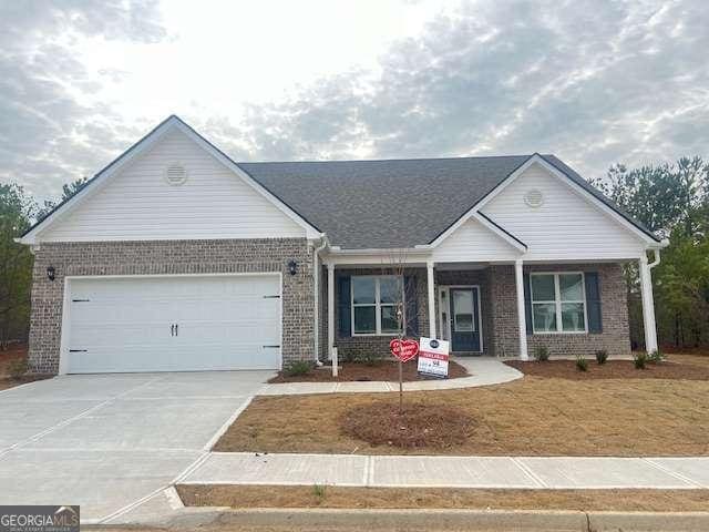 ranch-style home with a garage