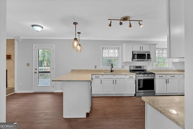 4138 Hickory Dr, Powder Springs, GA 30127 - kitchen featuring appliances with stainless steel finishes, pendant lighting, and white cabinets