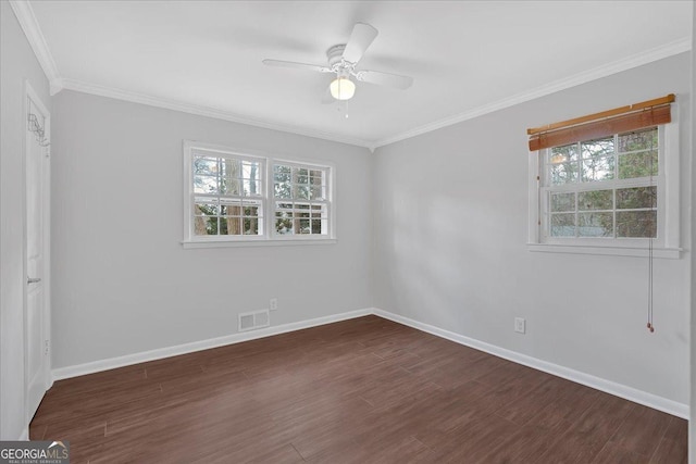 4138 Hickory Dr, Powder Springs, GA 30127 - empty room featuring ornamental molding, plenty of natural light, and dark hardwood / wood-style floors