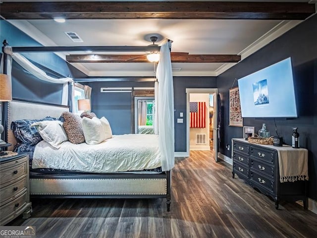 bedroom with crown molding, beam ceiling, and dark hardwood / wood-style flooring