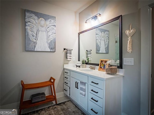 bathroom featuring vanity and tile patterned flooring