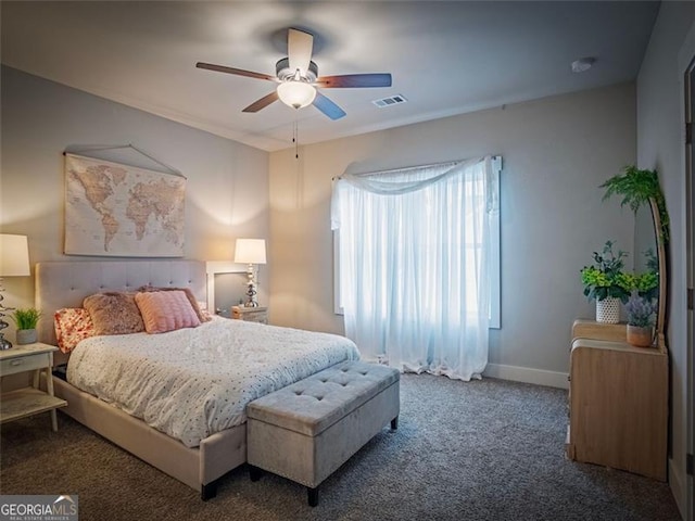 bedroom with ceiling fan and carpet flooring