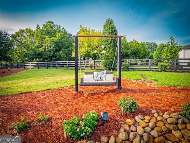 view of home's community with an outdoor living space and a yard