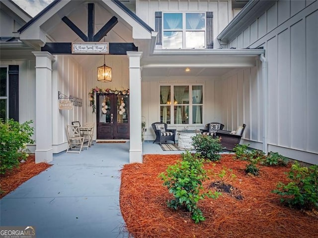 property entrance featuring covered porch