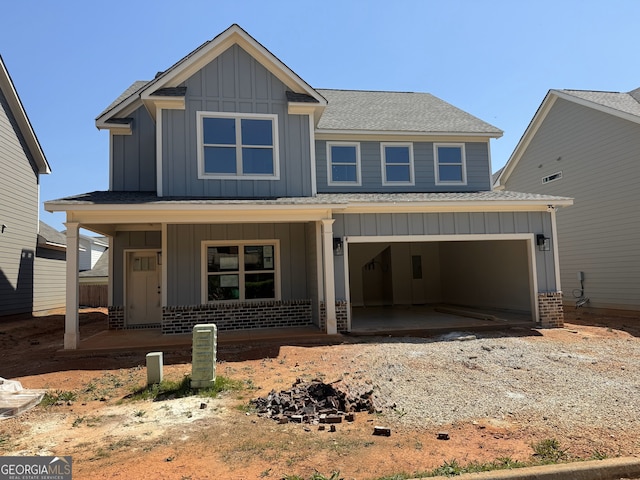 321 Ridge Pointe Dr, Athens, GA 30606 - view of front of property with board and batten siding, a porch, and a shingled roof