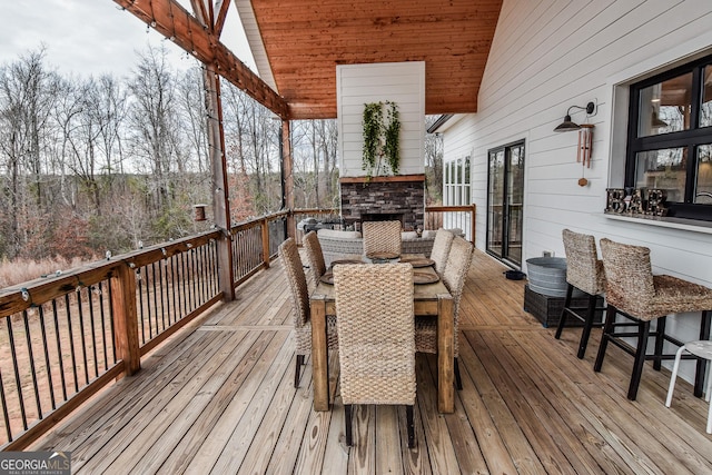 wooden deck featuring an outdoor bar