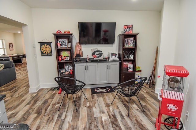 interior space with hardwood / wood-style floors