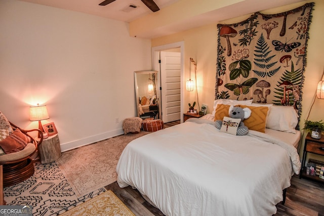 bedroom featuring hardwood / wood-style floors and ceiling fan