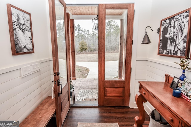 doorway to outside with dark hardwood / wood-style floors