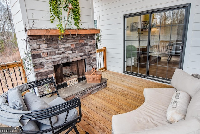 deck featuring a fireplace