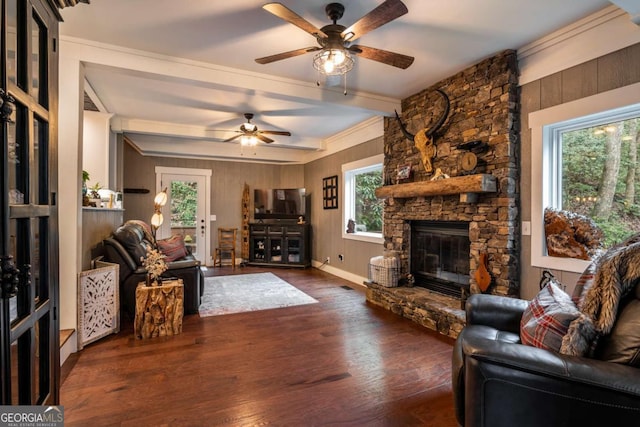 185 Huckleberry Cove Rd, Jasper, GA 30143 - living area with ceiling fan, a stone fireplace, beam ceiling, wood finished floors, and wood walls