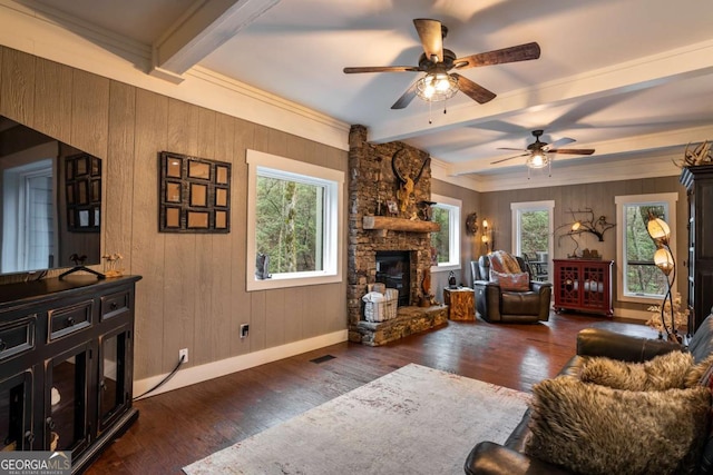 185 Huckleberry Cove Rd, Jasper, GA 30143 - living room with healthy amount of natural light, beamed ceiling, a ceiling fan, a fireplace, and wood finished floors