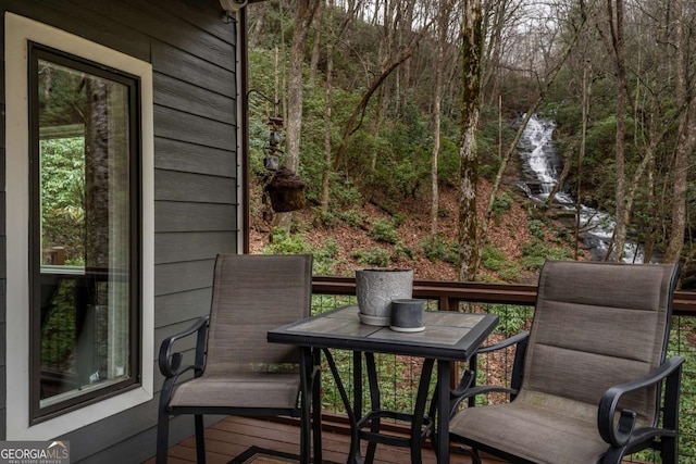 185 Huckleberry Cove Rd, Jasper, GA 30143 - deck with outdoor dining area and a view of trees
