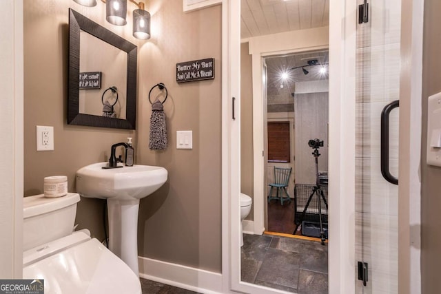 185 Huckleberry Cove Rd, Jasper, GA 30143 - bathroom with toilet and baseboards