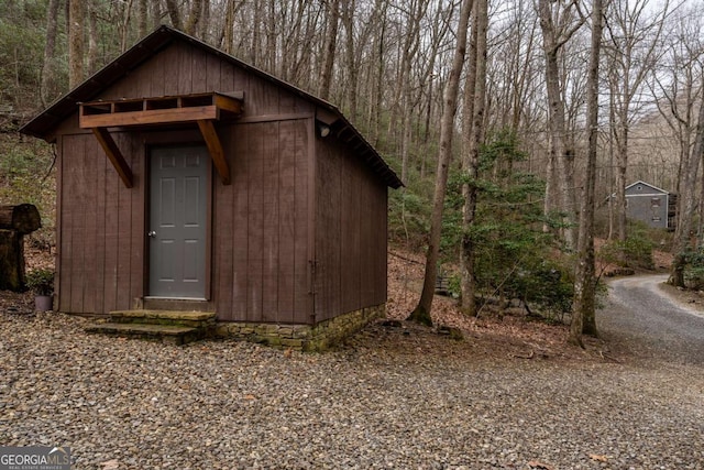 185 Huckleberry Cove Rd, Jasper, GA 30143 - view of outbuilding featuring a view of trees