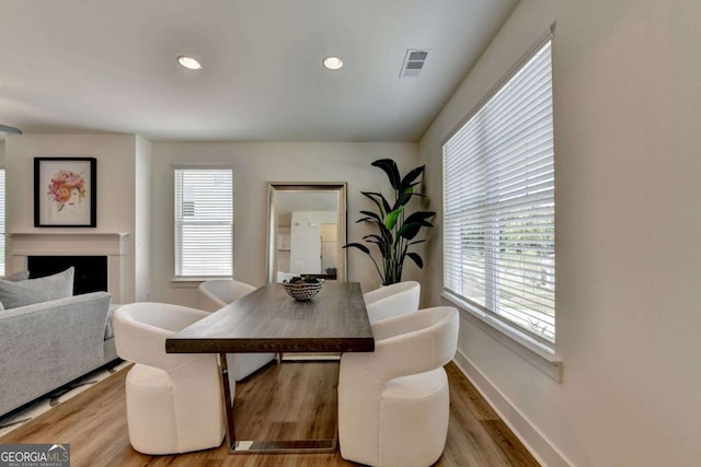 dining room with hardwood / wood-style floors