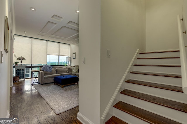 staircase featuring a wall of windows, recessed lighting, wood finished floors, and baseboards