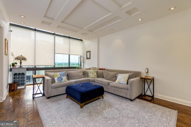 living room featuring crown molding, wood finished floors, baseboards, and coffered ceiling