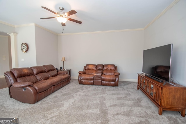 living area featuring light carpet, crown molding, ornate columns, and ceiling fan