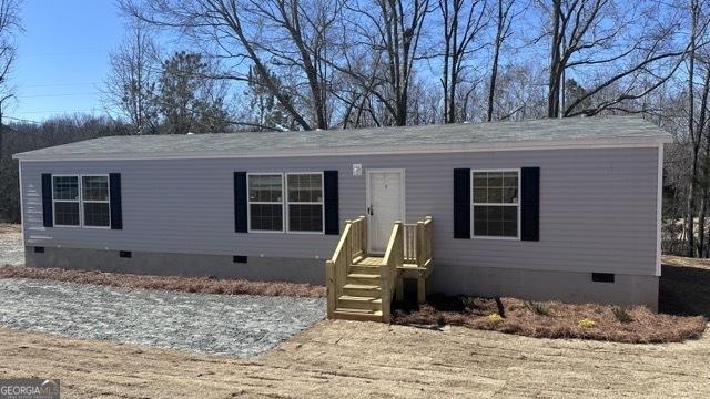 view of front of property with crawl space