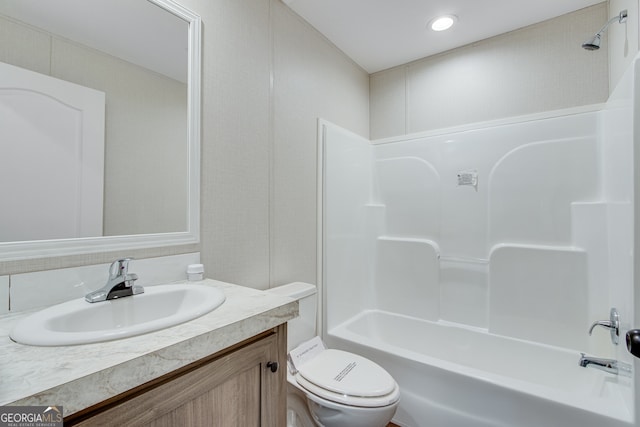 full bath with shower / washtub combination, vanity, and toilet