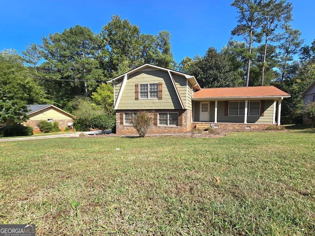 tri-level home featuring a front lawn