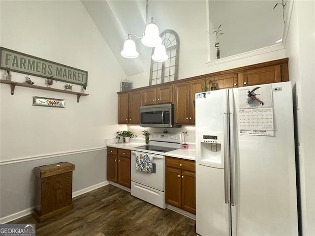 kitchen featuring high vaulted ceiling, a chandelier, hanging light fixtures, dark wood-type flooring, and white appliances