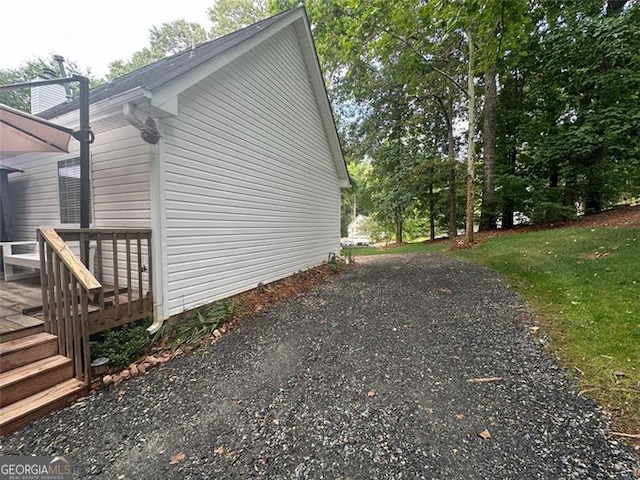 view of side of property with a deck