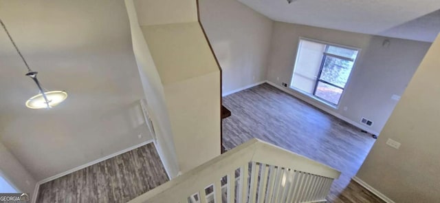 foyer entrance with dark hardwood / wood-style floors