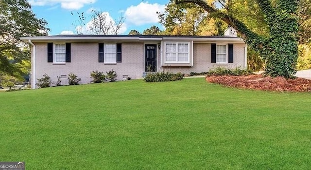 single story home with a front yard