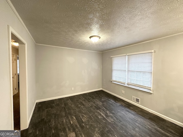 spare room with crown molding, dark hardwood / wood-style floors, and a textured ceiling