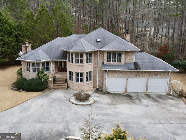 view of front of property with a garage