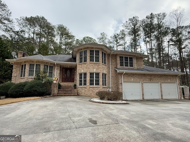 view of front of home with a garage