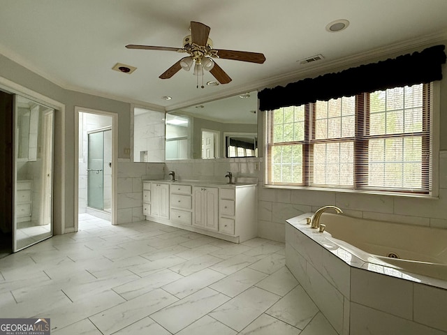 bathroom featuring vanity, shower with separate bathtub, ornamental molding, and ceiling fan