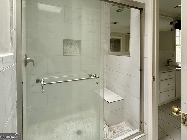 bathroom featuring sink and walk in shower