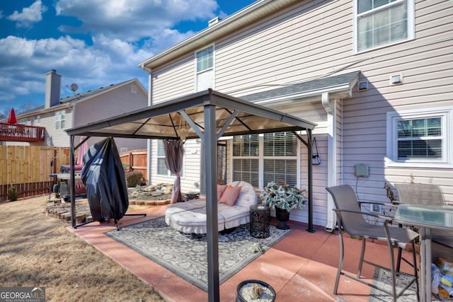 view of patio / terrace featuring a gazebo and grilling area