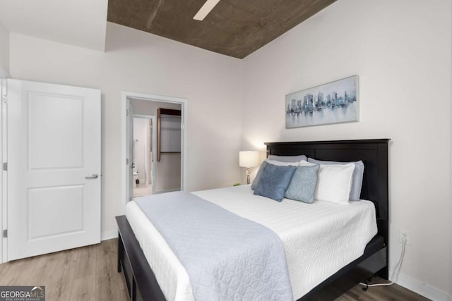 bedroom with hardwood / wood-style floors and ceiling fan