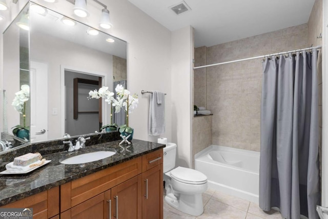 full bathroom featuring shower / tub combo with curtain, vanity, toilet, and tile patterned flooring