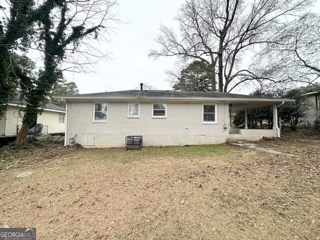 1785 San Gabriel Ave, Decatur, GA 30032 - rear view of property featuring brick siding and crawl space