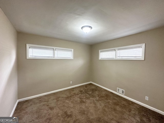 1785 San Gabriel Ave, Decatur, GA 30032 - empty room with baseboards and carpet floors