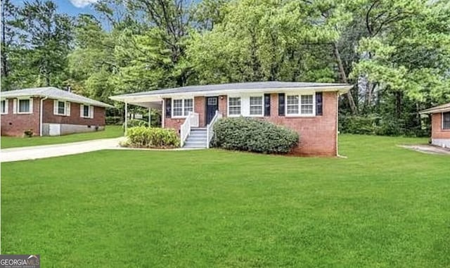 ranch-style home featuring a front yard