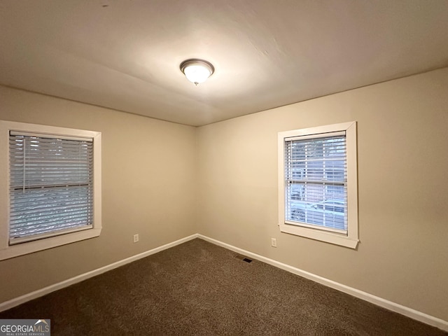 view of carpeted spare room