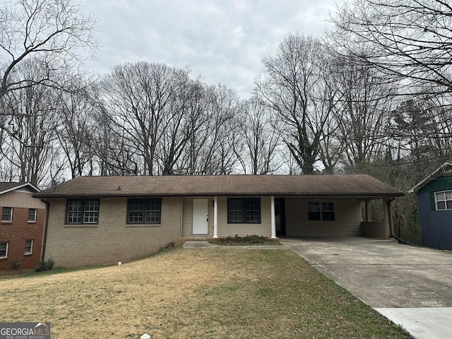 ranch-style house with a carport and a front yard