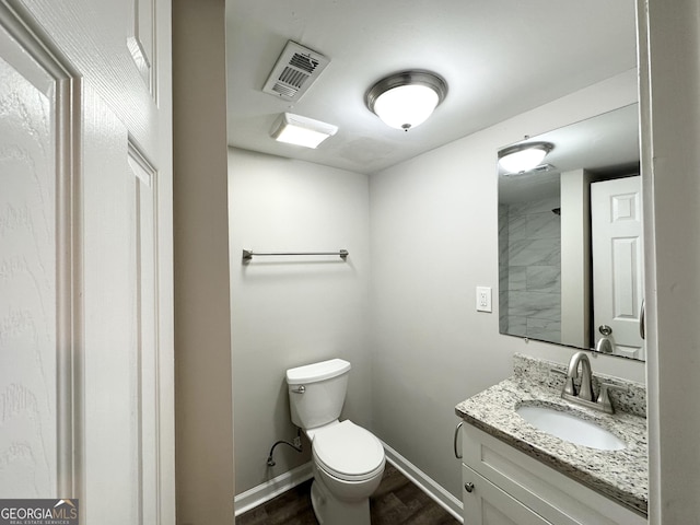 3174 Kingston Rd NW, Atlanta, GA 30318 - bathroom with vanity and wood finished floors
