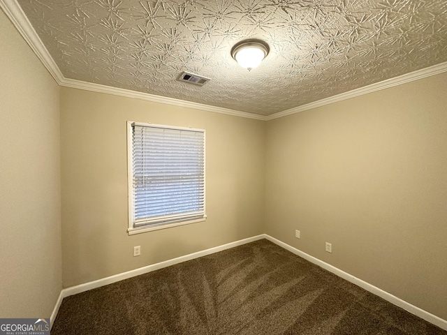 empty room with ornamental molding and carpet