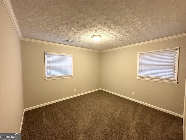 unfurnished room with a textured ceiling, ornamental molding, a healthy amount of sunlight, and carpet